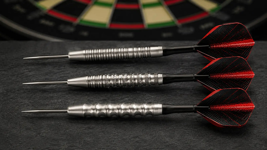 Three darts showing different barrel shapes and grip patterns