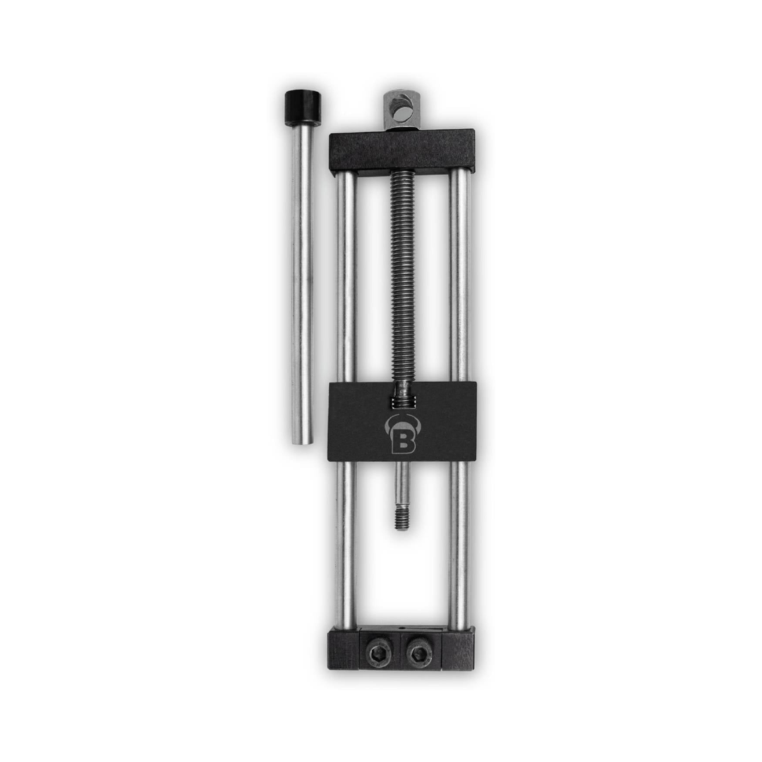 Bull's Pointman steel-tip dart repointer 64010; complete black repointing tool and its photographed operating handle on white.