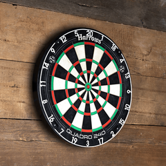 Harrows Quadro 240 dartboard mounted on a wooden wall